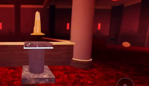 The delivered gold candle on the same pedestal one second later.